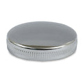 Early bayonet style gas cap, vented right side. Chrome